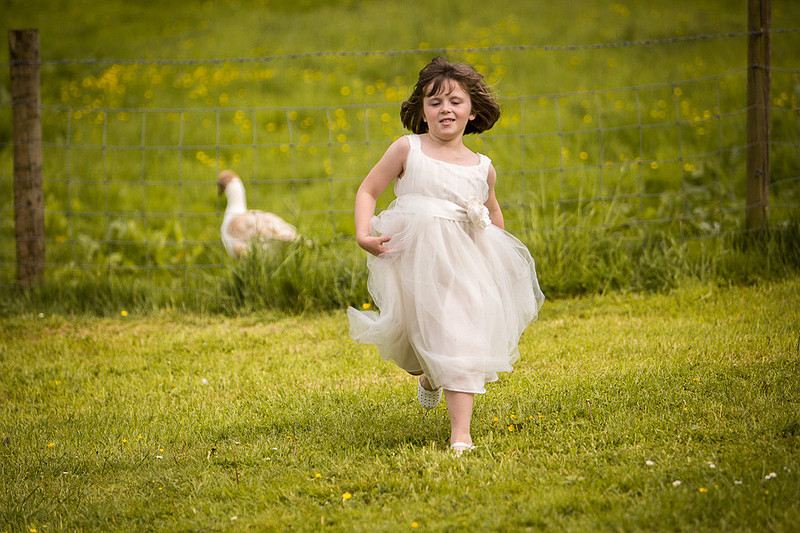 young bridesmaid running